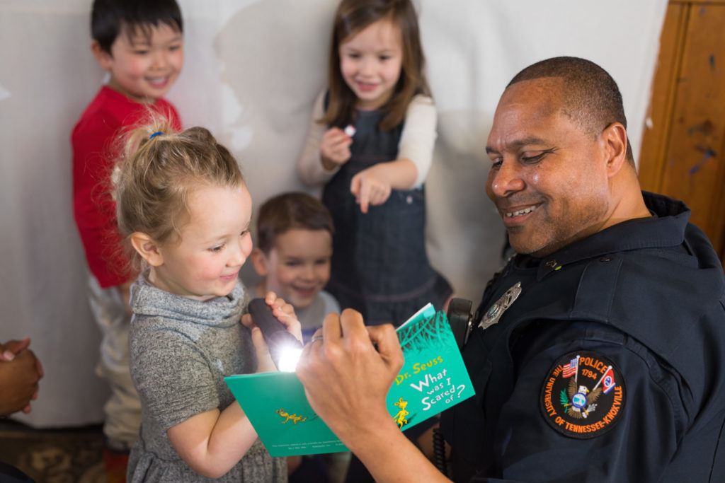 UT Police Read to Children at the Early Learning Center