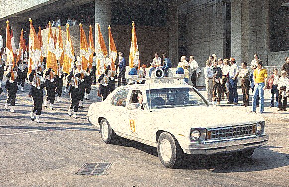 1970s UTPD cruiser leading the Pride of the Southland band