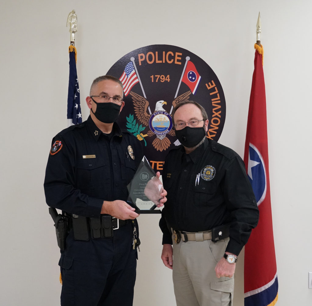 Chief Troy Lane, left, accepts UTPD's award from Steve Dillard, senior law enforcement liaison for the Tennessee Highway Safety Office.
