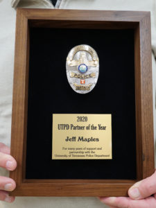 The 2020 UTPD Partner of the Year Award with an honorary badge.